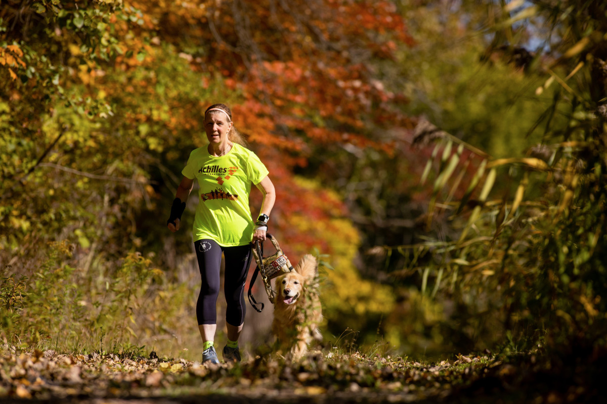 Helminski trains with her service dog, Zoey, but in New York will be accompanied by a human guide supplied by Achilles International.